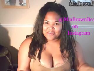 Mia pumps and embraces milk out of her big brown tits