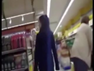 Charming mademoiselle flashes in supermarket then gives a sh