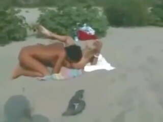 Two Lesbians Finger and Lick Each other on the Beach.