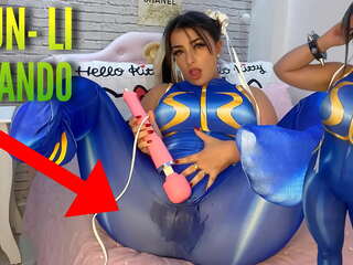 Flirty cosplay schoolgirl dressed as Chun Li from street fighter playing with her htachi vibrator cumming and soaking her panties and pants ahegao