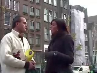 With his guide lustful turist visits a fancy woman in amsterdam